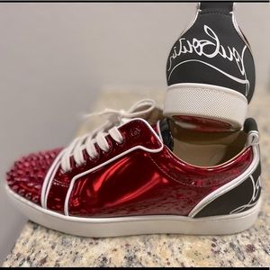 Christian Louboutin (red bottoms) “42”